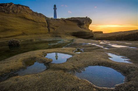 Castle Point Lighthouse near the village of Castlepoint, North Island ...